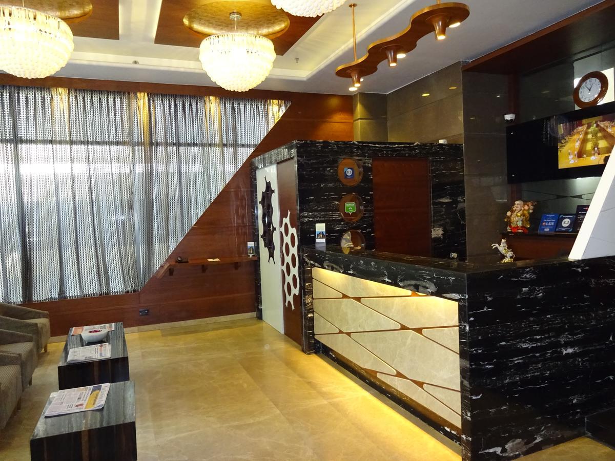 Hotel Cosmopolitan Ahmedabad Extérieur photo